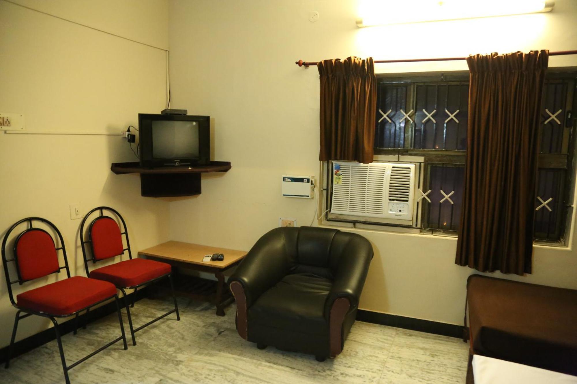 Rmc Travellers Inn Madrás Habitación foto